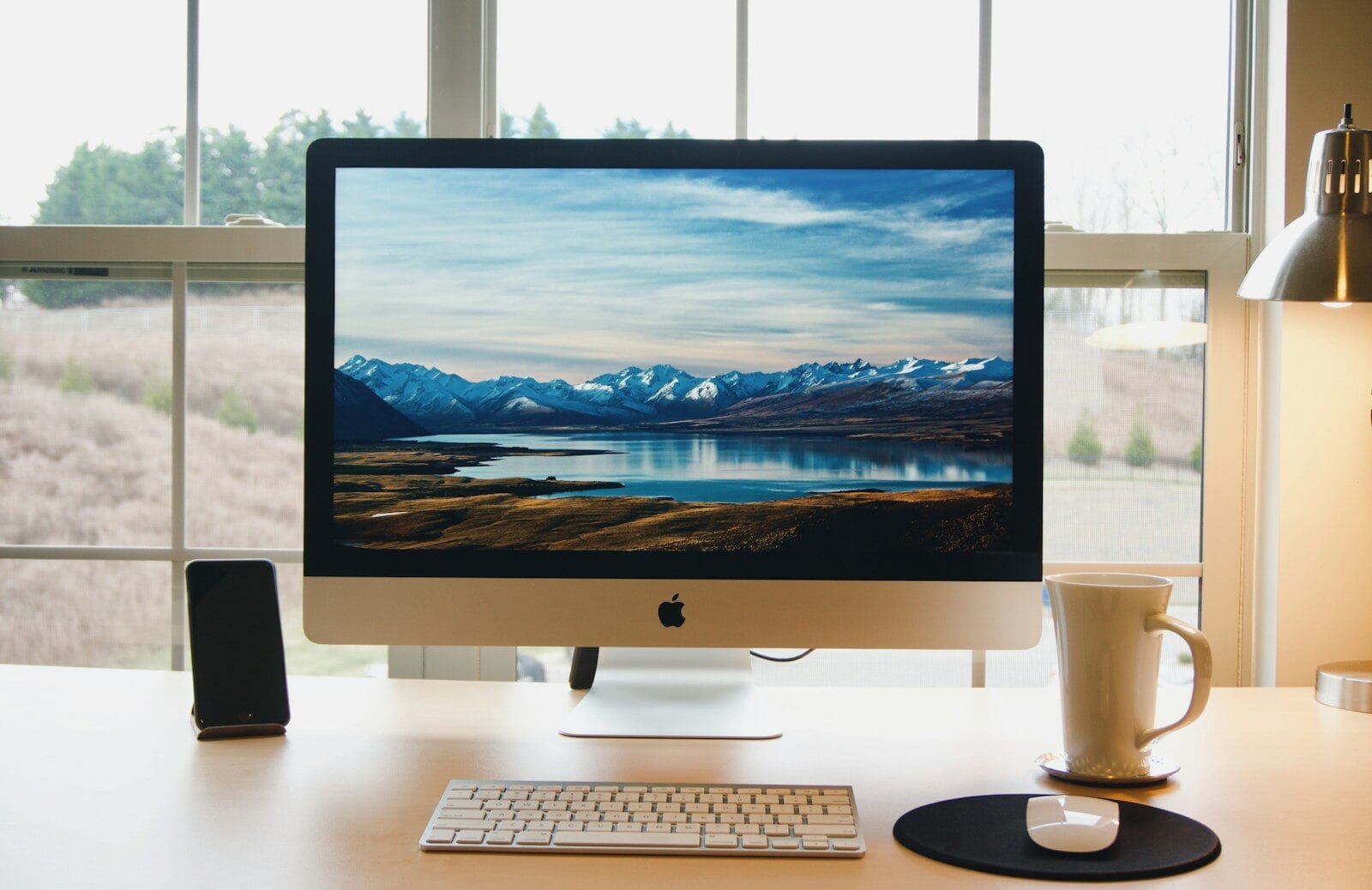 iMac workstation with keyboard and mouse iMac workstation with keyboard and mouse